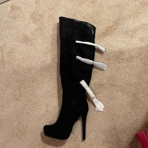 Never been worn over the knee boots